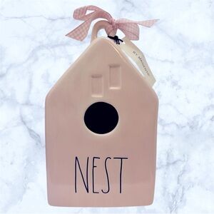 Pink Rae Dunn birdhouse.